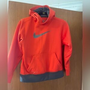 Kids Nike Therma-Fit Orange with gray trim on bottom sweatshirt